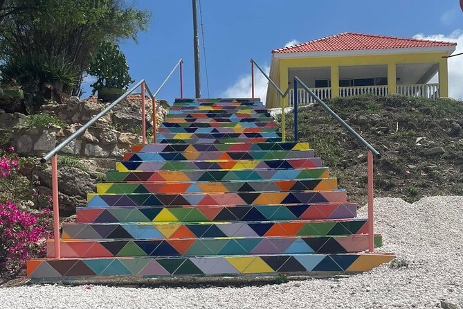 Curacao Private Food Tour - Punda from the vehicle: signs, streets, and the floating market
