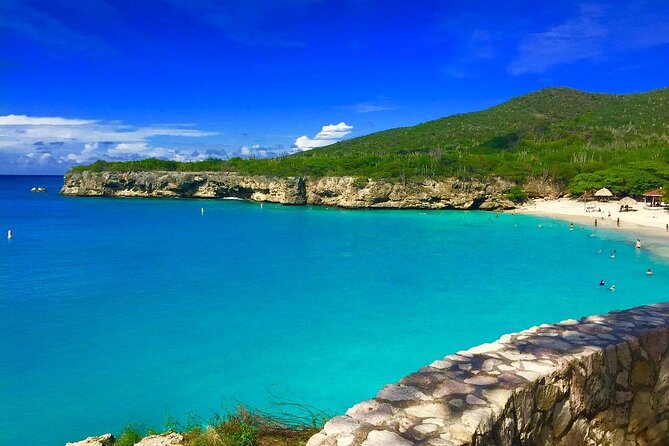 Curaçao West Coast Tour: Hato Caves, Grote Knip & Daaibooi Beach - Hato Caves: petroglyphs, rock formations, and plenty of steps
