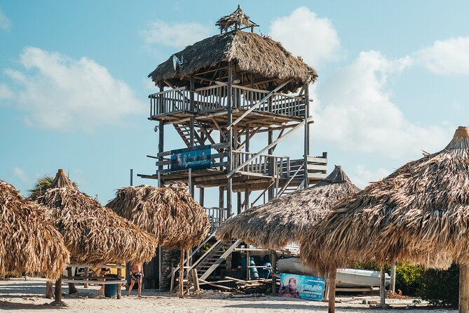 Klein Curaçao Full Day Boat Trip - Walk beyond the beach to the lighthouse and wrecks