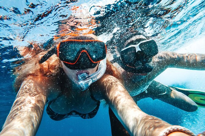 Snorkel Cruise with BBQ Lunch and Open Bar - The first Caracas Bay stop and the sunken tugboat
