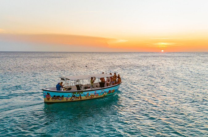 Sunset Boat Trip in the Spanish water and coastline of Curacao - Chicken skewers, rum punch, and a simple evening meal