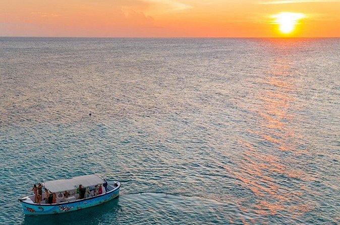 Sunset Boat Trip in the Spanish water and coastline of Curacao - Timing, weather, and cancellation rules