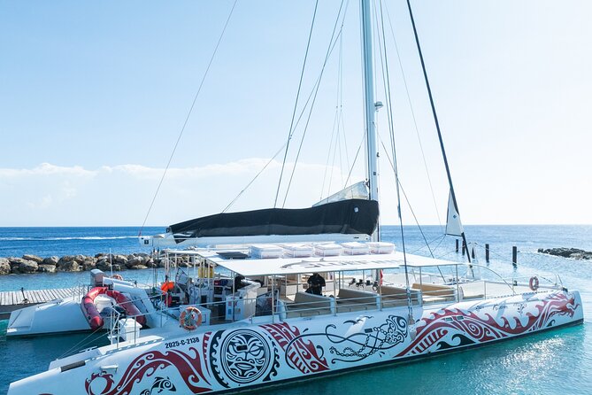 Sunset Sailing Cruise with premium drinks and bites - The East Coast, Caracas Bay, and Fuik Bay
